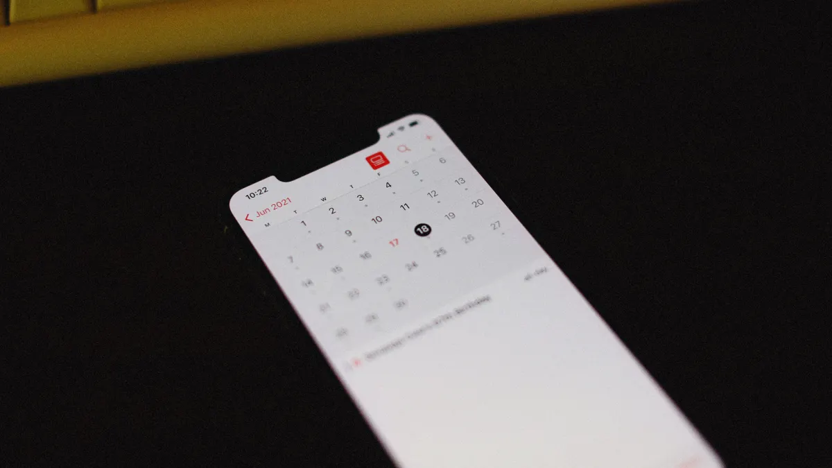 AI Appointment Booking for Local Businesses smartphone showing a calendar app