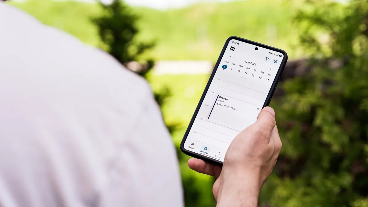 Person using a smartphone scheduling app